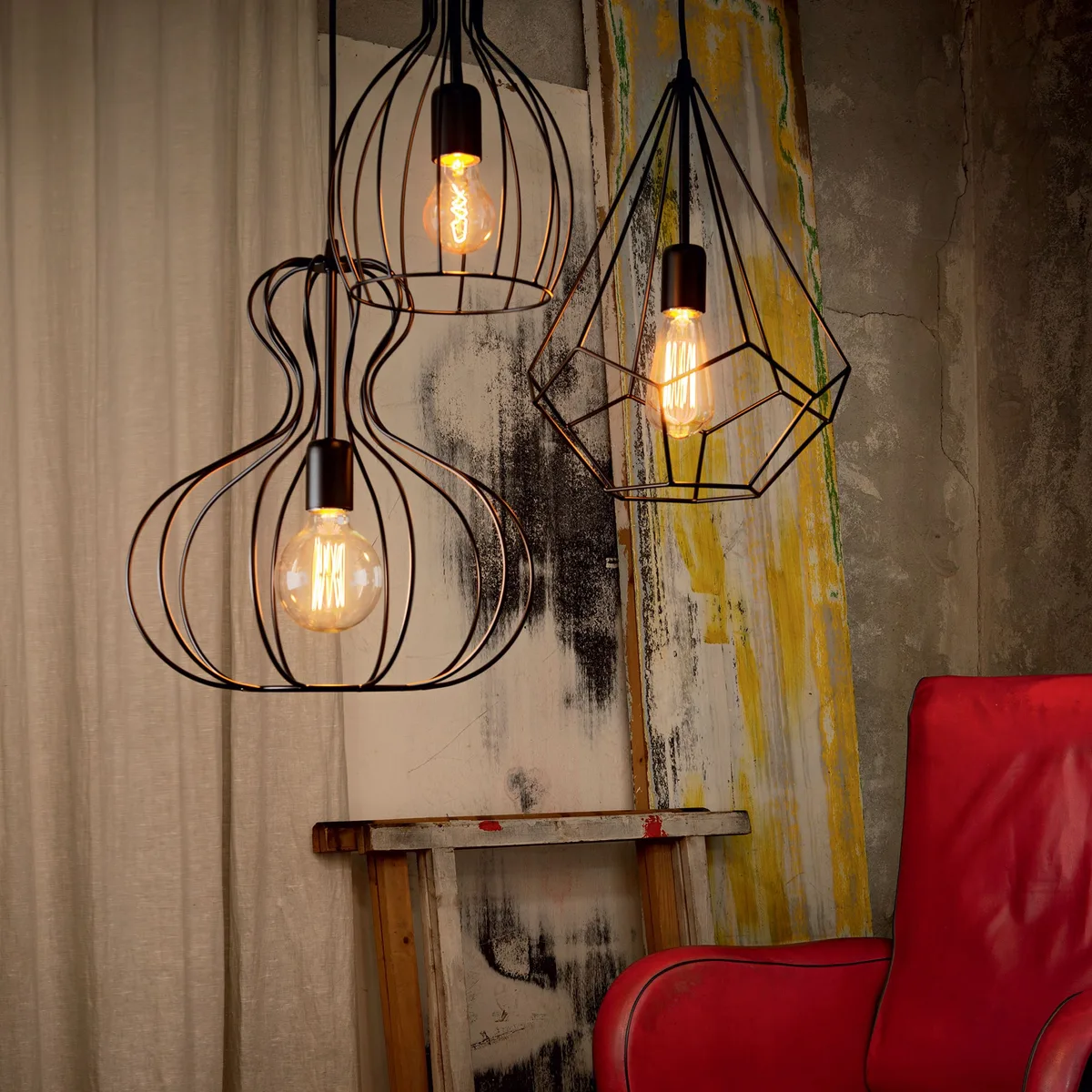 Ampolla wire cage pendants with exposed bulbs